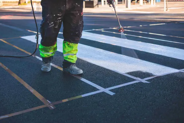 North Georgia crew performing pavement markings and line striping to enhance roadway safety.
