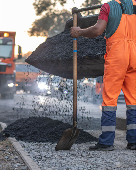 workers building metallic road